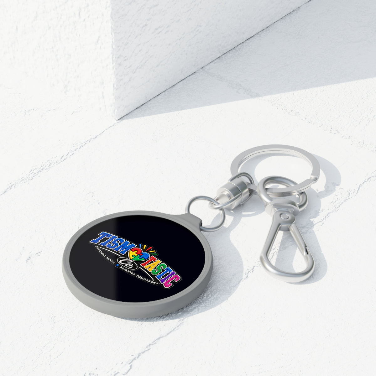 Color Tismtastic Logo Keyring Tag — Black background Round Metal Keychain with Carabiner Clip
