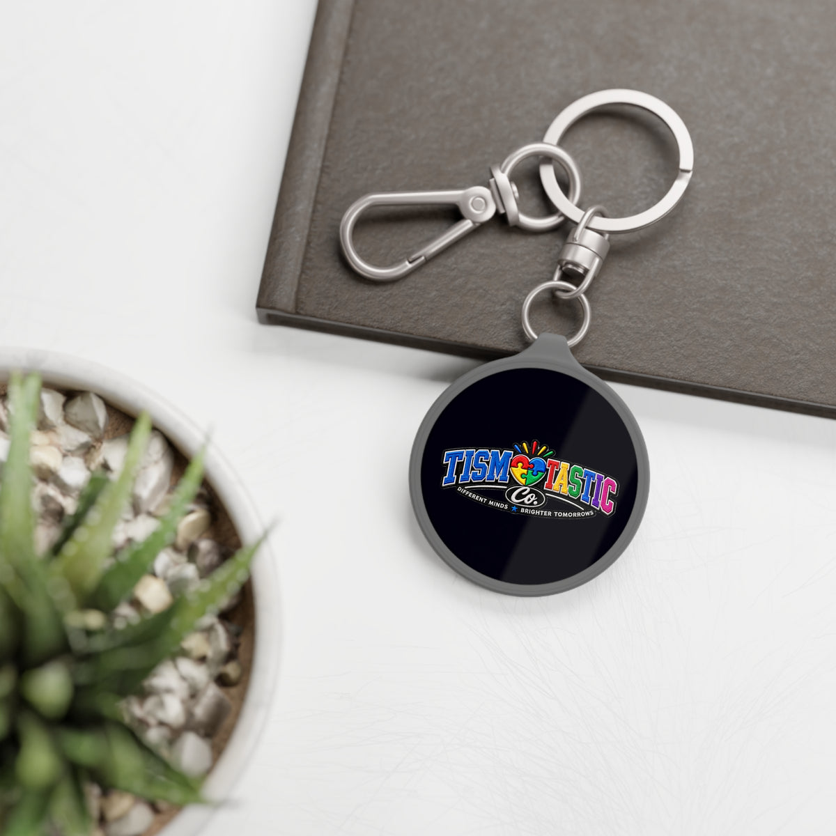 Tismtastic Logo Keyring Tag — Black background Round Metal Keychain with Carabiner Clip